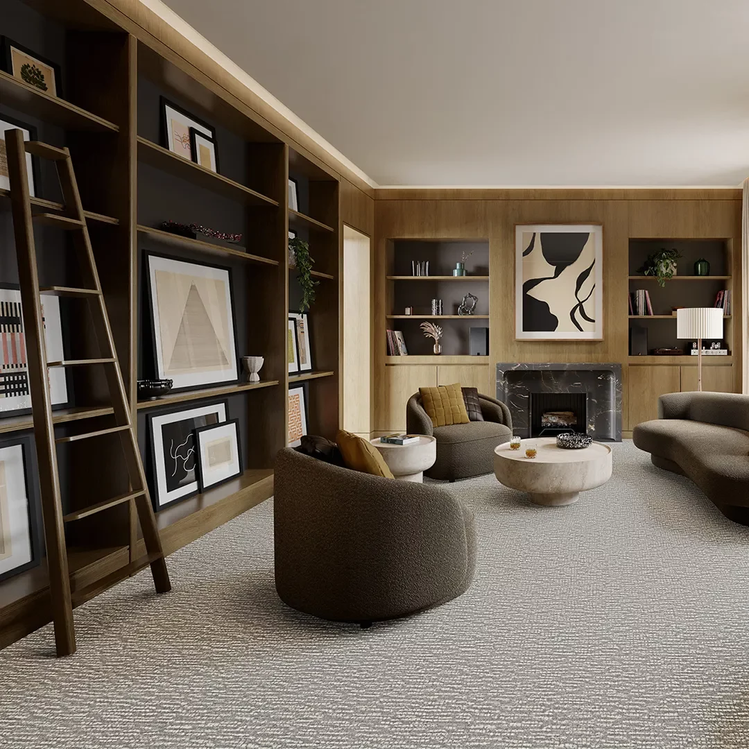 Neutral carpet in sitting area with built in cabinets and fireplace